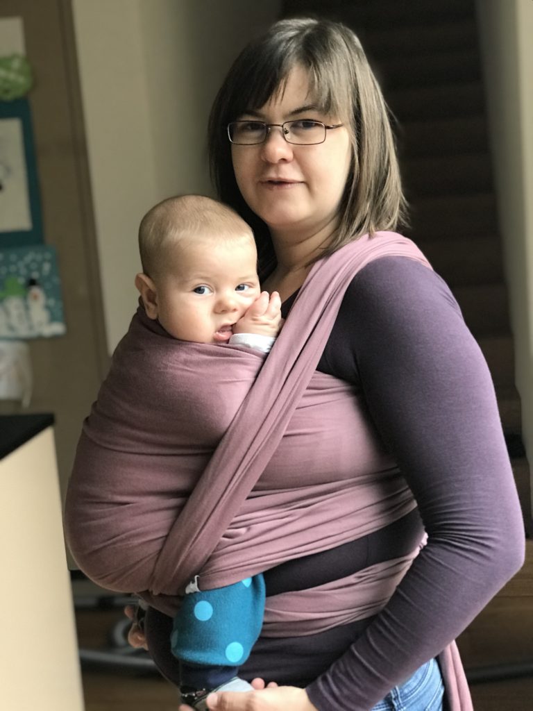 Mama wearing baby in a wrap