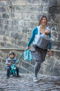 babywearing consultant Anna wearing her child