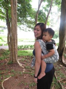 Babywearing mama and consultant with her baby
