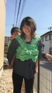 Babywearing in Japan - Junko Kato with her boy on the back in a woven wrap