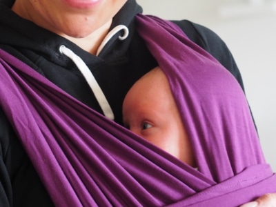 Mom with baby in a stretchy wrap